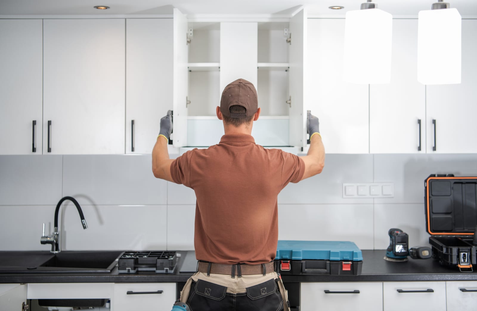 Cabinet installation in progress during a kitchen remodel