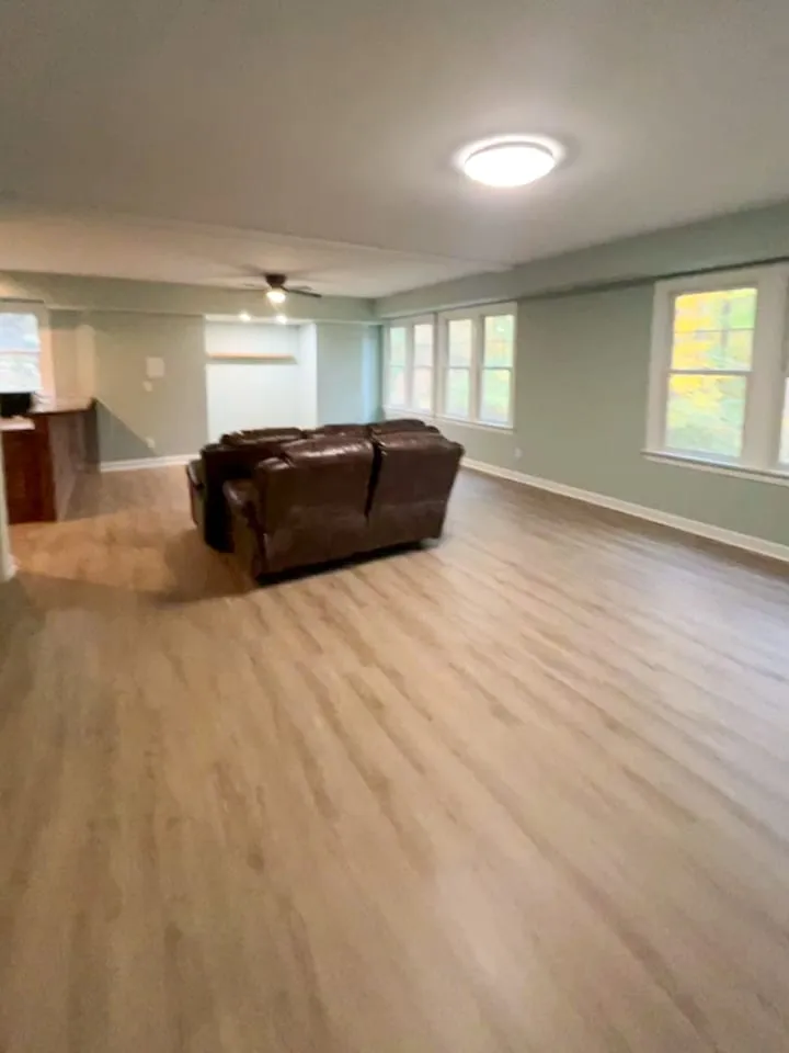 New flooring across a finished living area